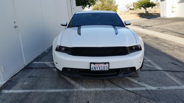 Black stripes on hood with blacked out grille and headlights
