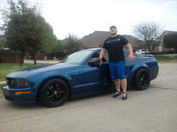 Me and my ride.  Geez I didn't know I was this fuckin big compared to my car I must look dumb driving it haha