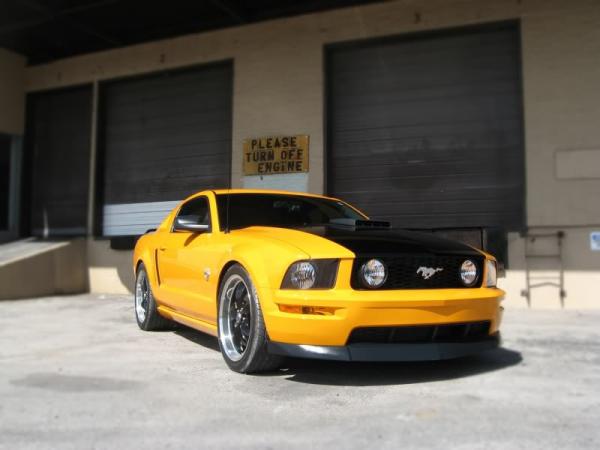 This is the Oringinal Setup as of May 2009
Grabber Orange 2009 Mustang GT with Appearance Mods.
FRPP Springs, Flowmaster American Thunder, CDC Shake