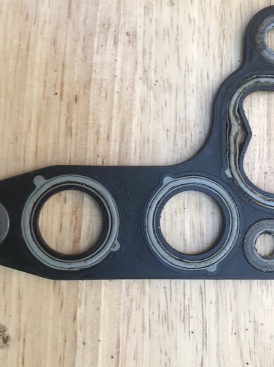 Original OEM Ford Oil Adapter Gasket Engine Block Side (1).JPG