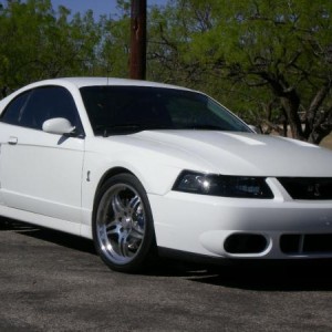 BBK Longtubes, O/R H-pipe, and flowmaster series 40's.  KB 2.2, custom tuning, 19" CCW w/ Nitto Invo's.  613 HP!!!!!