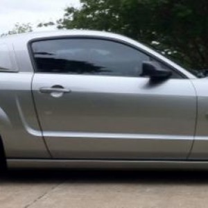 Passenger side view of the Eibach Pro Kit added with the staggered anthracite bullitt 18x10 rear wheels and 18x9 front rims