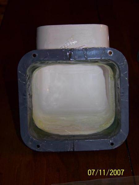 plastic downspout parts mated together with epoxy and fiberglass matting